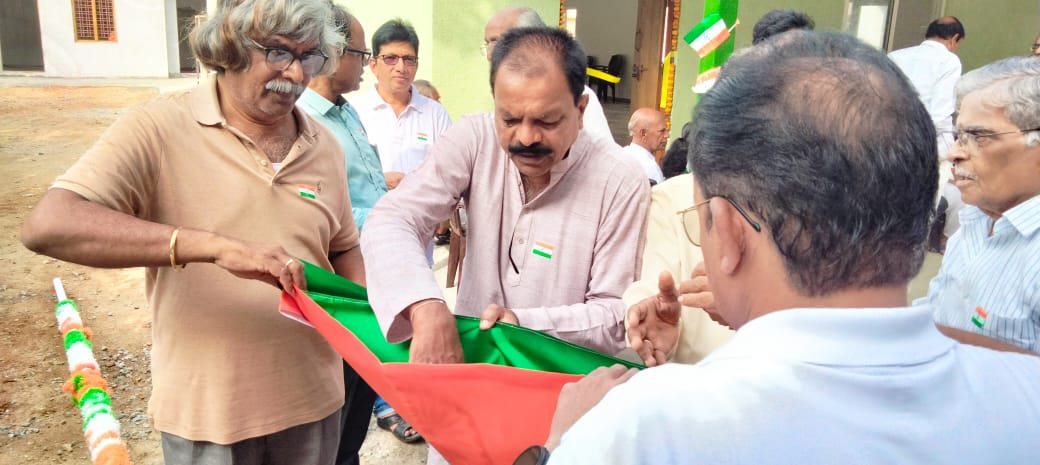 4. Dr. Prabhu garu and Manohar Rao garu preparing the National flag for hoisting on 1st independence day program at our senior citizen office